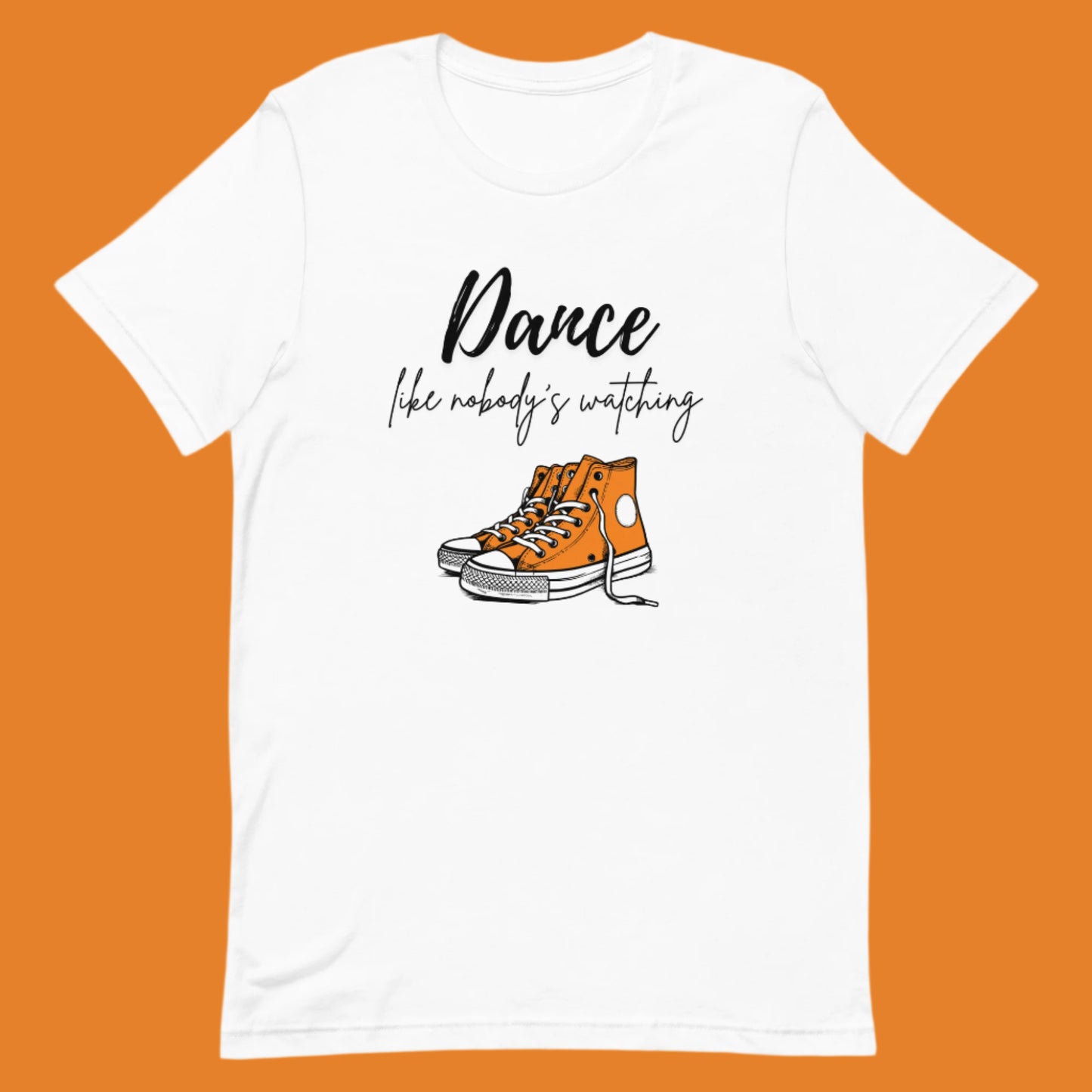White unisex dance t-shirt with the phrase “Dance Like Nobody’s Watching”. A carefree and uplifting design for those who dance freely and unapologetically.