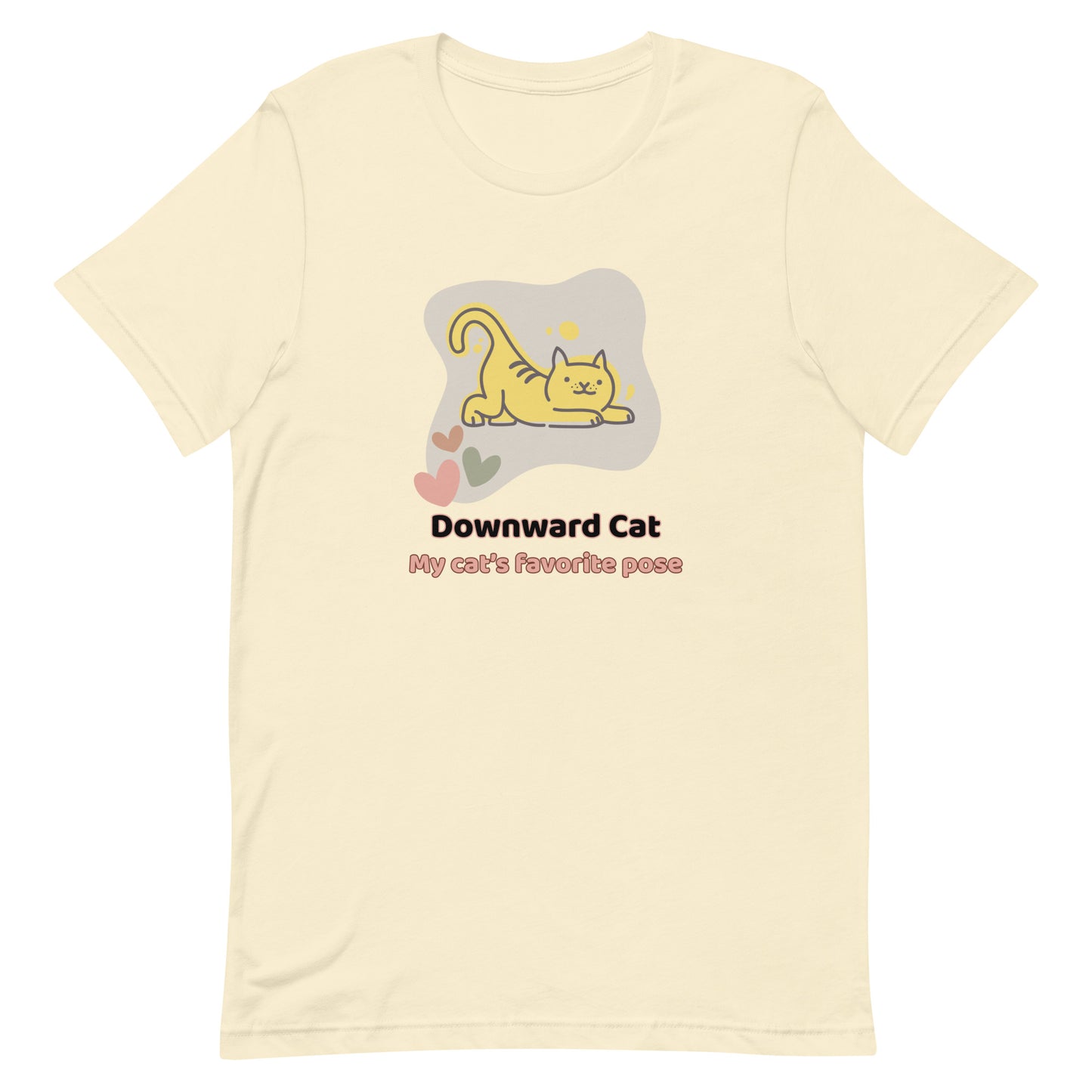 Natural unisex yoga t-shirt featuring a playful cartoon illustration of a cat doing a yoga stretch, paired with the text “Downward Cat: My Cat’s Favorite Pose.”