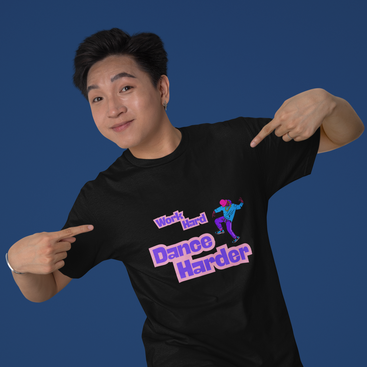 Man wearing a black unisex dance t-shirt with phrase "Work Hard Dance Harder"