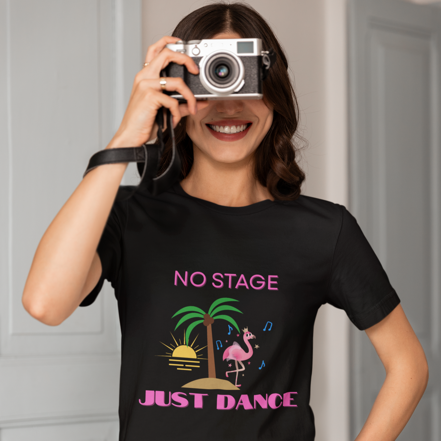 Woman wearing black unisex dance t-shirt with the phrase “I Don’t Need a Stage, Just a Dance Floor” in clean, expressive lettering. A bold and empowering design for dancers who bring the vibe anywhere they go.