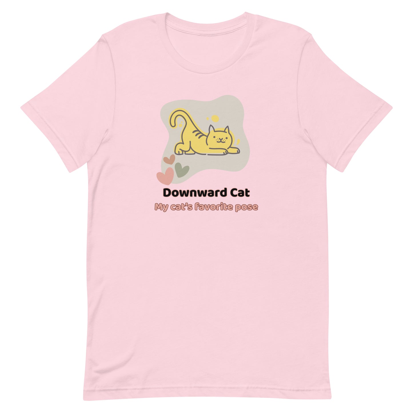 Front view of “Downward Cat – My Cat’s Favorite Pose” unisex t-shirt in soft pink – cute yoga cat tee featuring a stretching yellow cat graphic by MM Tee Lab.