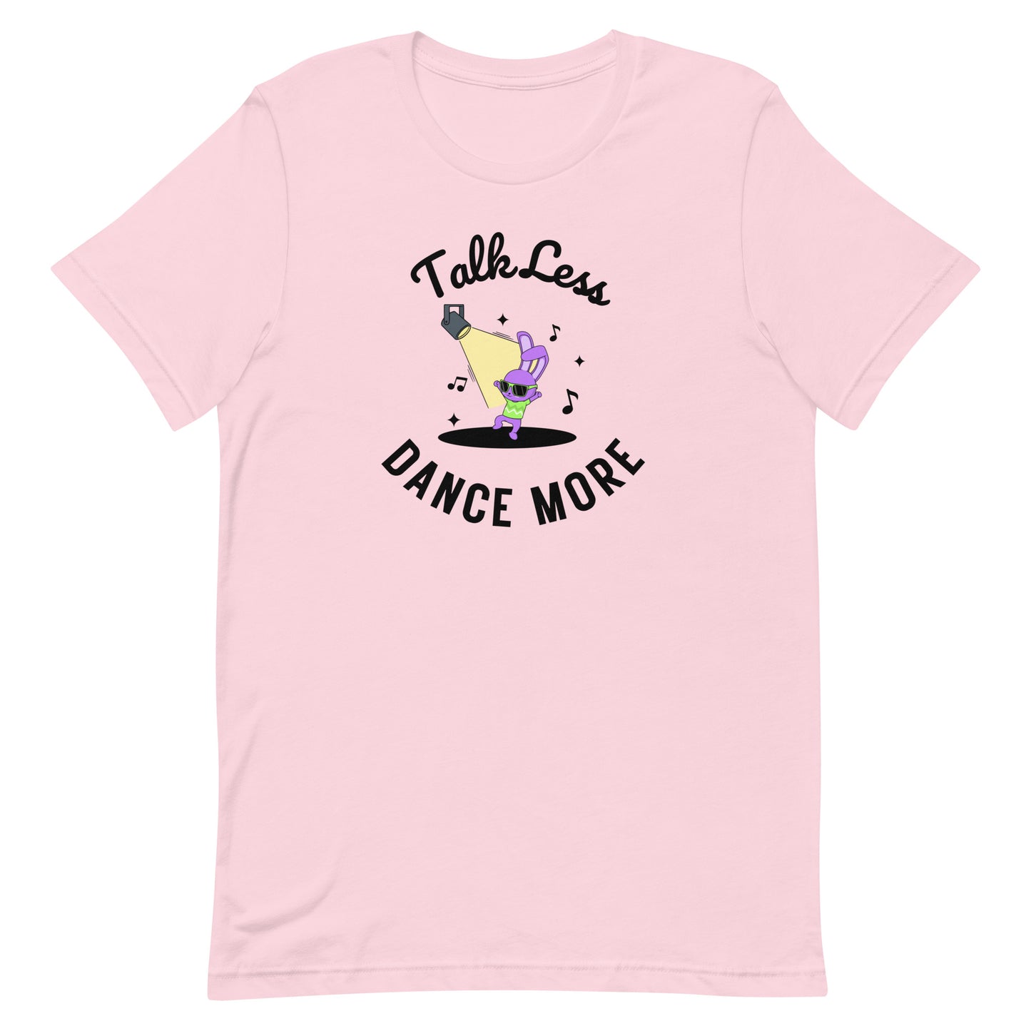 Front view of “Talk Less Dance More” unisex t-shirt in soft pink – fun motivational dance tee featuring a cartoon dancer under spotlight by MM Tee Lab.