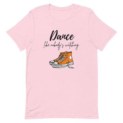 Soft pink unisex dance t-shirt with the phrase “Dance Like Nobody’s Watching”. A carefree and uplifting design for those who dance freely and unapologetically.