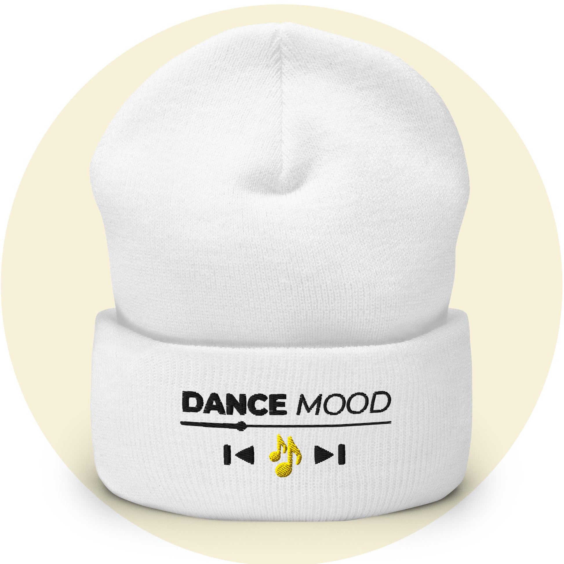 White cuffed beanie from the Dance Mood On collection with embroidered text and yellow music note icon, displayed on a light yellow background