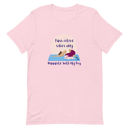 Soft pink unisex yoga t-shirt with the phrase “Paw-sitive Vibes Only Namaste with My Dog”