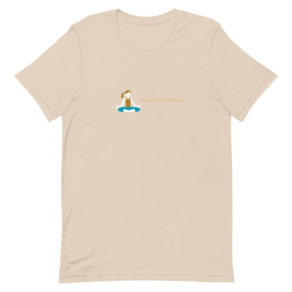 Soft cream unisex t-shirt with the quote “Breathe. Stretch. Avoid People.”