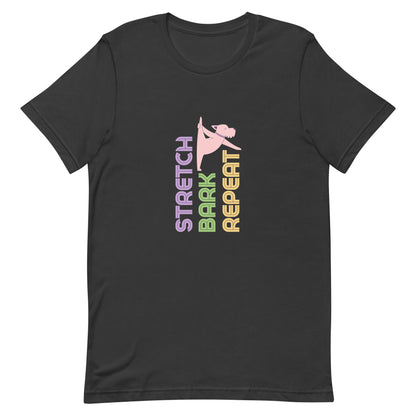 Dark grey unisex yoga t-shirt with the phrase “Stretch. Bark. Repeat.” displayed alongside a cartoon dog in a playful stretching pose. 
