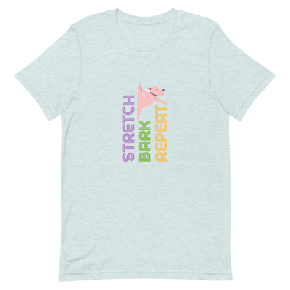 Heather ice blue unisex yoga t-shirt with the phrase “Stretch. Bark. Repeat.” displayed alongside a cartoon dog in a playful stretching pose. 