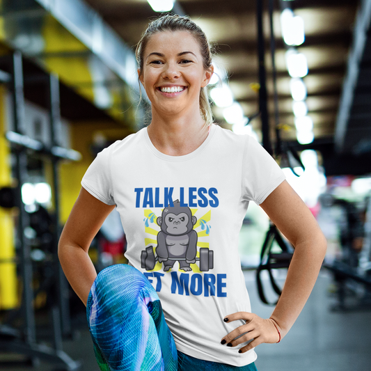 Woman wearing white unisex gym tee featuring the phrase “Talk Less Lift More”