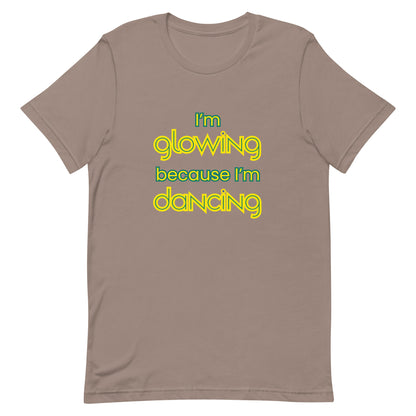 Pebble unisex dance t-shirt with the phrase “I’m Glowing Because I’m Dancing” in playful, radiant font. A cheerful and empowering design that captures the inner joy and confidence dancing brings.
