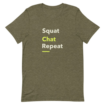 Heather olive green unisex gym t-shirt with the phrase “Squat Chat Repeat.” A cheeky and relatable gym-themed design for fitness lovers who mix reps with conversation.
