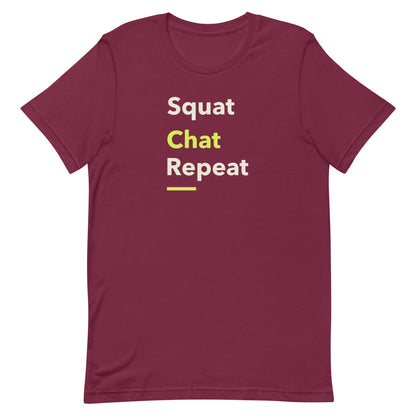 Front view of “Squat Chat Repeat” unisex t-shirt in maroon – fun gym and fitness quote tee with minimalist text design by MM Tee Lab.
